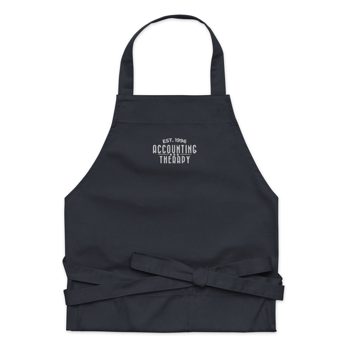Product mockup - Front view of a navy organic cotton apron showing a full-length kitchen apron with neck strap and front pocket